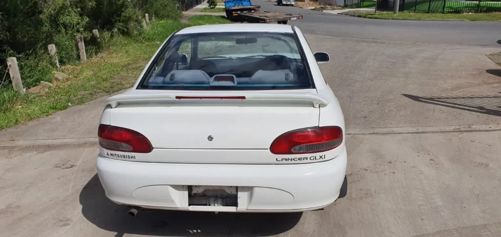 Car Wrecking - Mitsubishi Lancer 1994 White Auto Petrol