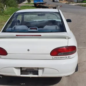 Car Wrecking - Mitsubishi Lancer 1994 White Auto Petrol