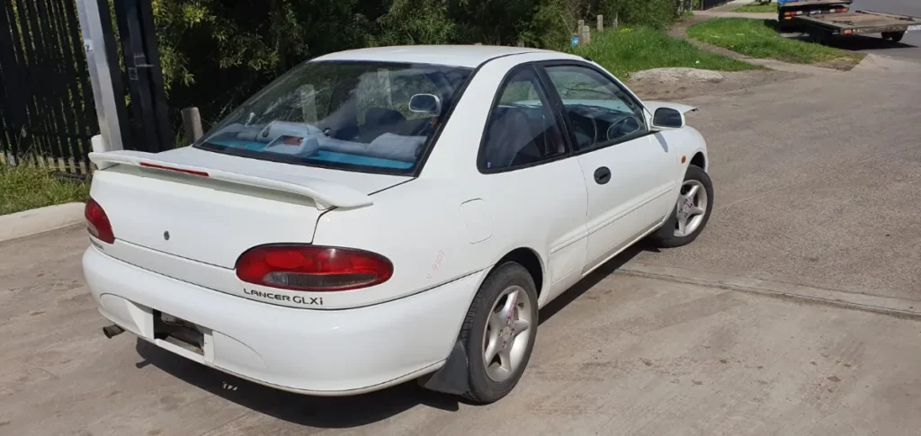 Car Wrecking - Mitsubishi Lancer 1994 White Auto Petrol