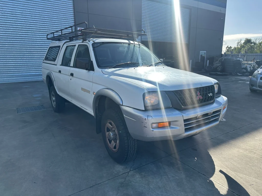 Mitsubishi Triton 2002 White Manual Petrol